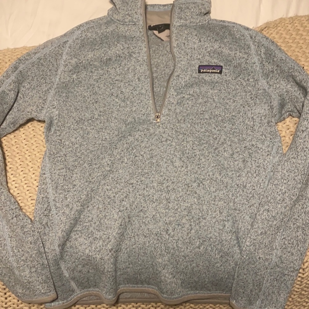Like new Patagonia 1/4 zip sweater, very warm! Wore skiing once